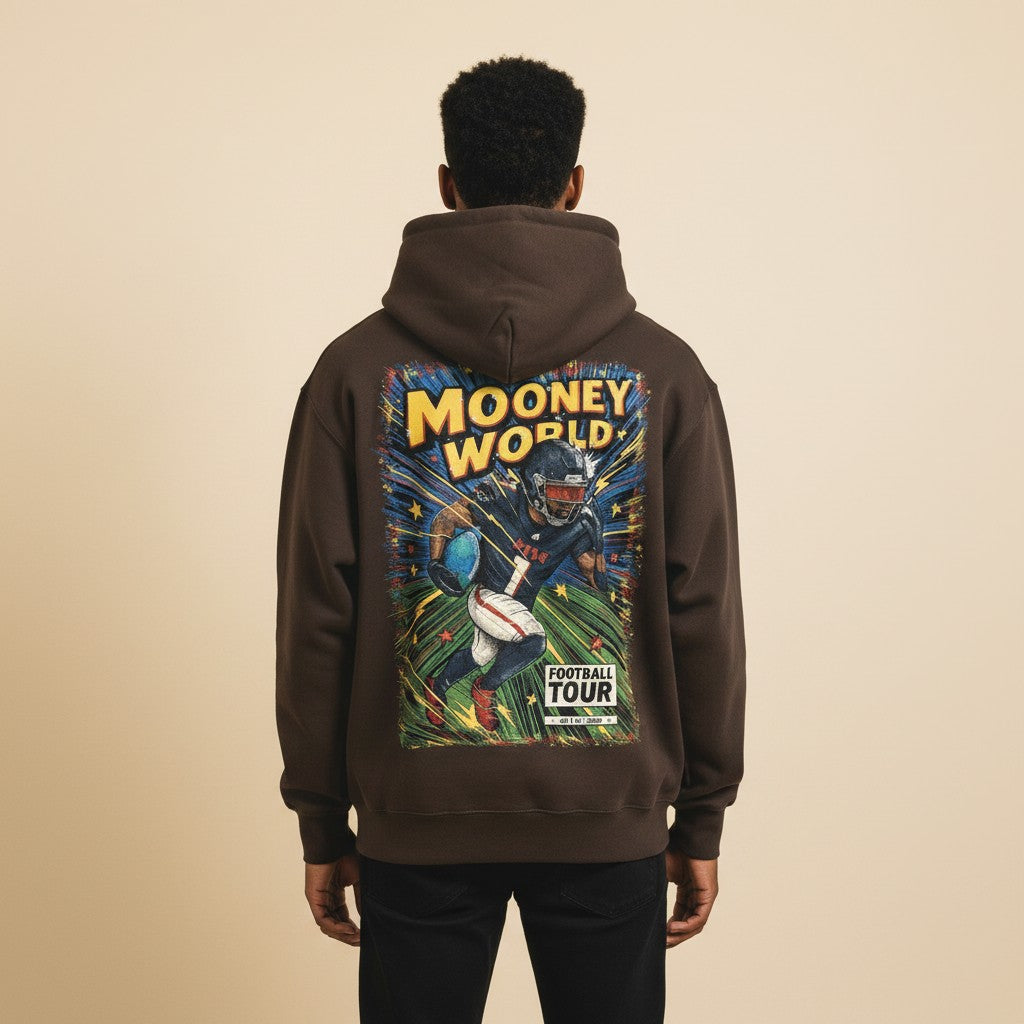 Athlete Xclusive Mooney World Comic Book Hoodie featuring a football player in action with "Football Tour" graphic. Dark brown, heavyweight cotton.