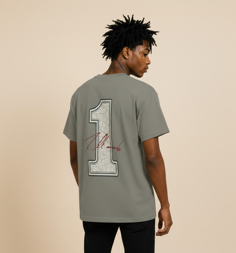 Athlete Xclusive The 1 Tee, gray cotton blend t-shirt with cracked effect graphic of number 1 and autograph on back.